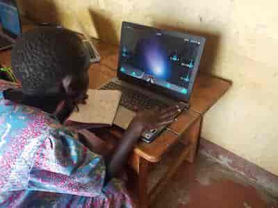 Sixth Grader, Sheila Kiplagat, playing TuxMath