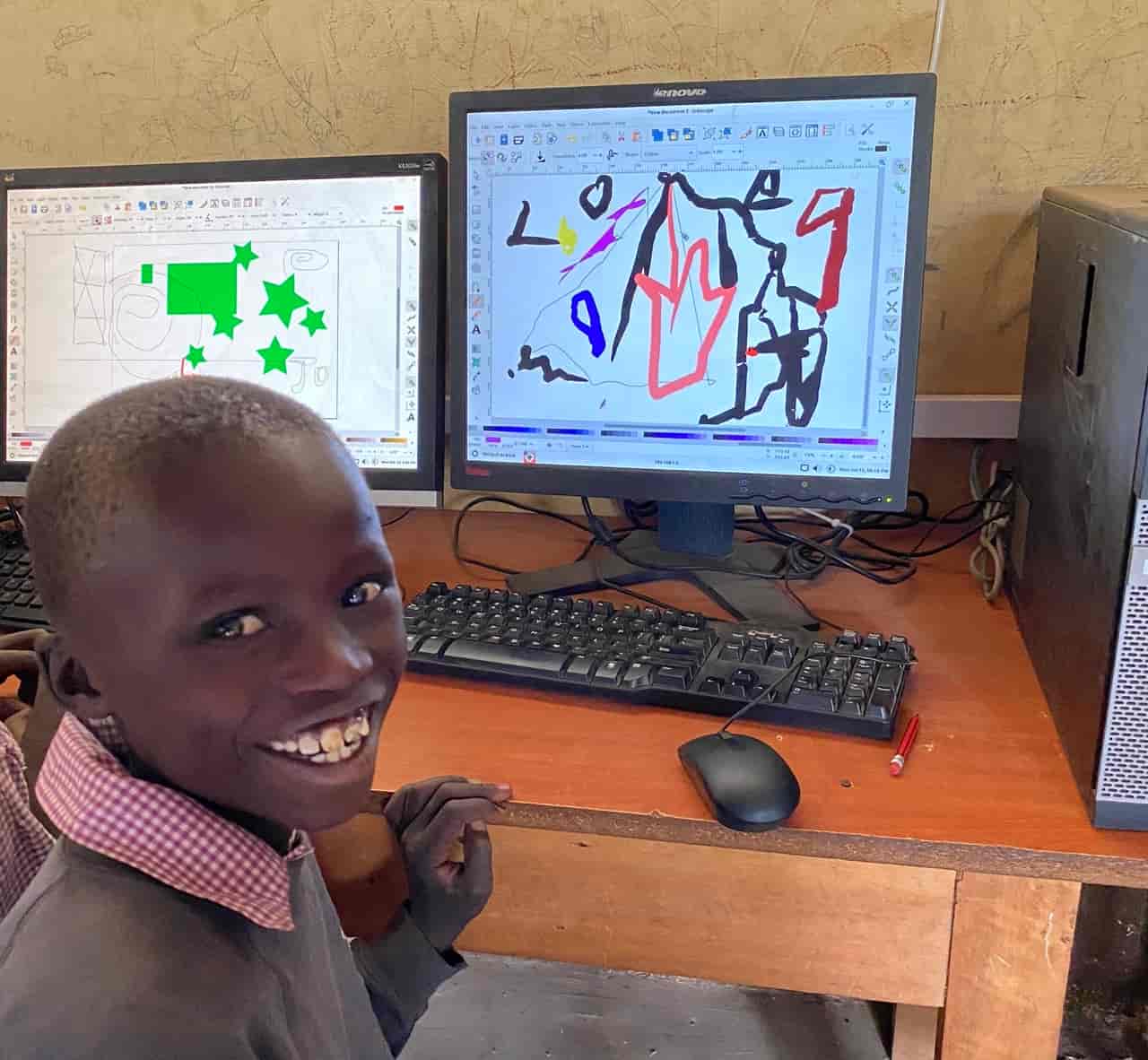 Student at Barina showing his abstract art on inkscape